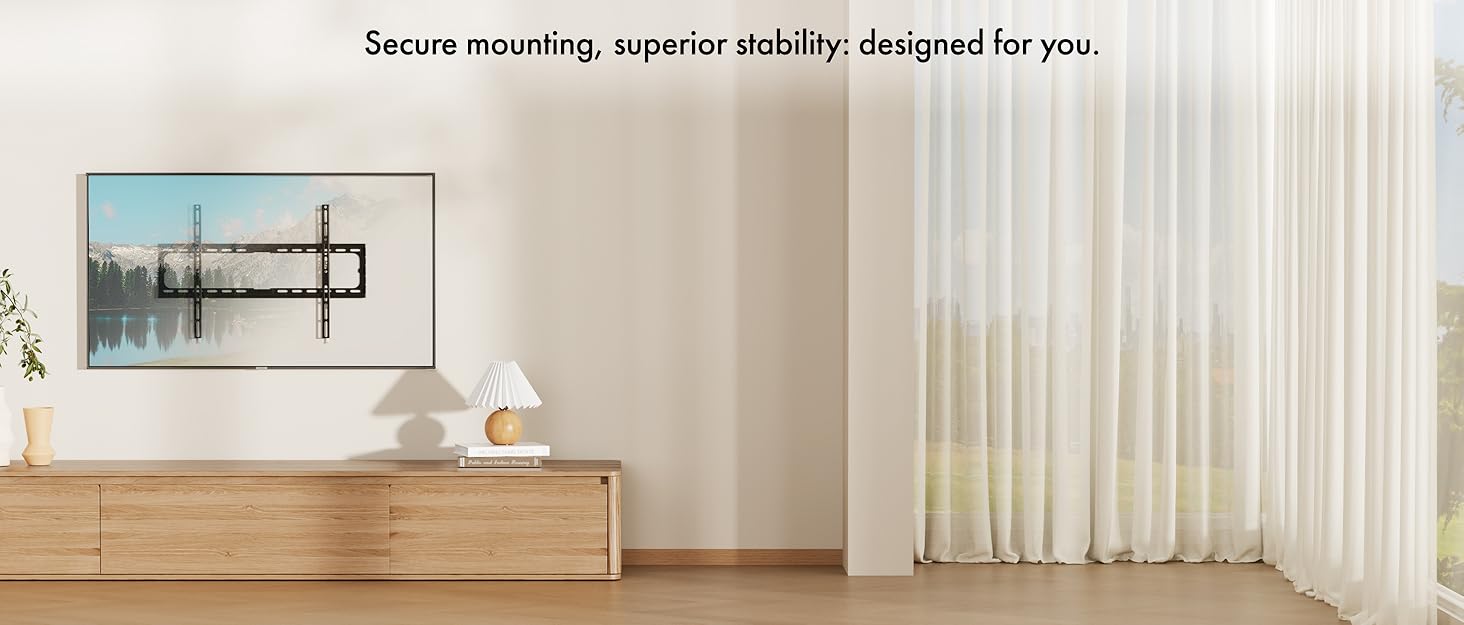 Interior home setting showing mounted TV on wall bracket above modern furniture in a bright, contemporary living room with natural lighting and curtains.